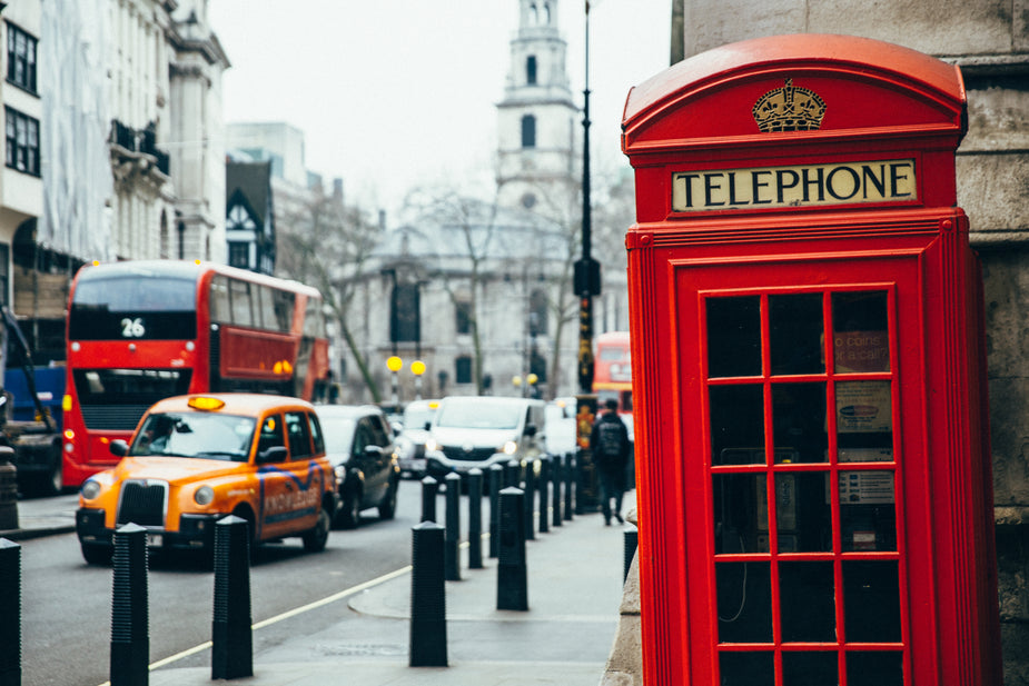 British phone booth outside on street.