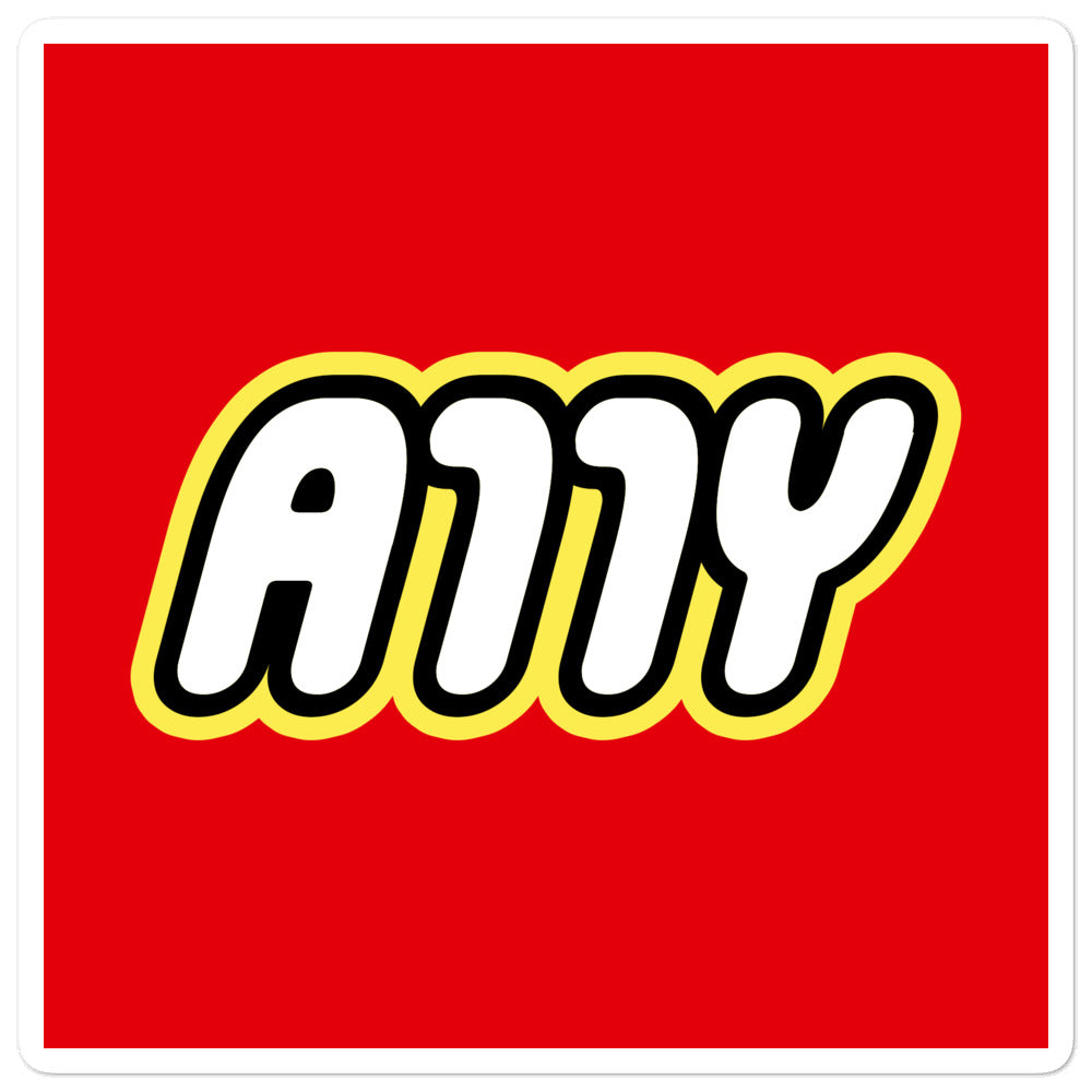 Rounded white A11Y letters surrounded by a black border, surrounded by a yellow border, center aligned on red 5.5 inch square sticker.