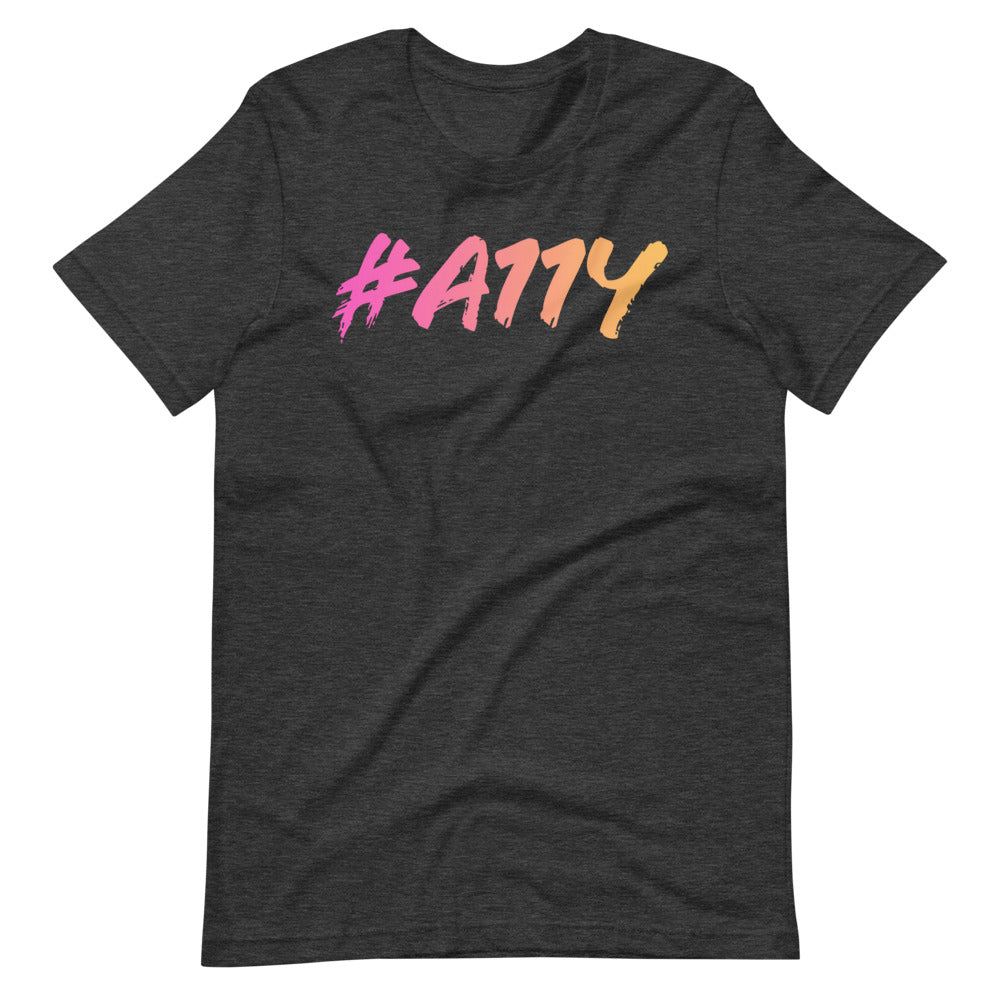 Left to right, dark pastel pink to pastel yellow gradient, large #A11Y letters on front of dark heather grey t-shirt.